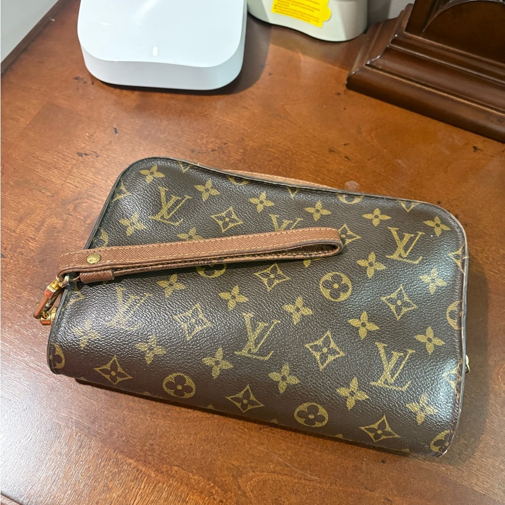 100 percent Authentic Louis  Vuitton ORSAY clutch.